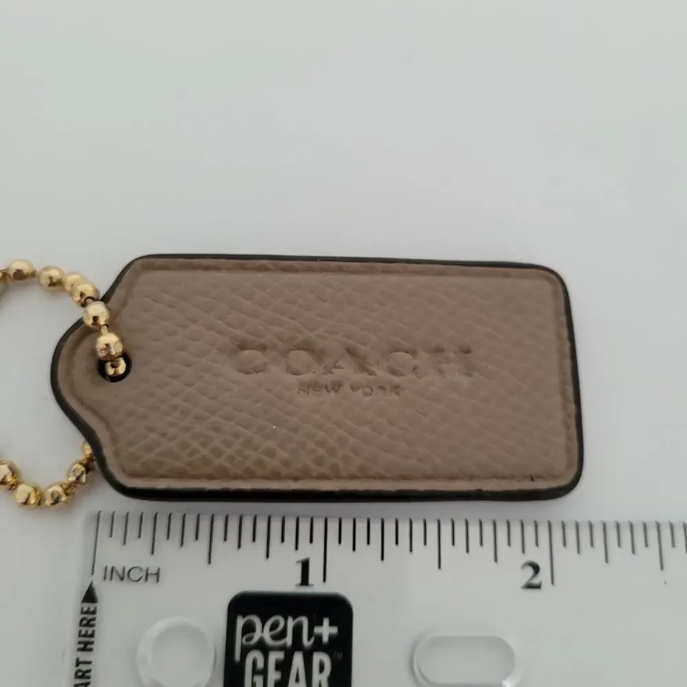 Coach hang tag
